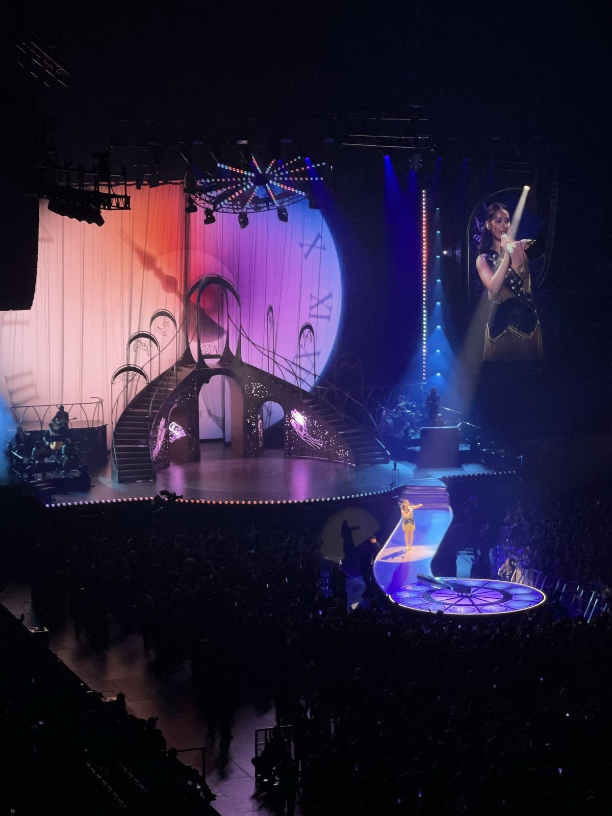 An ornate, moonlit concert stage set seen from above